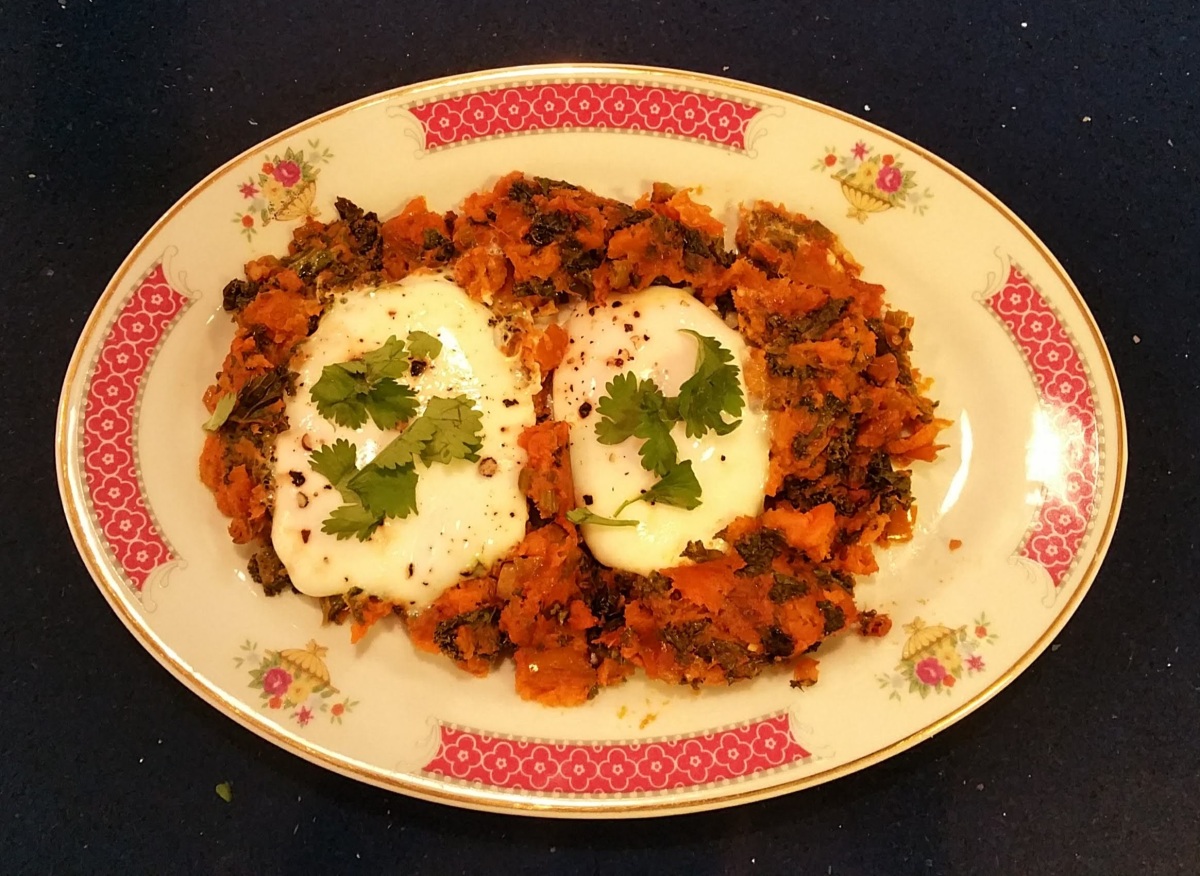 Sweet Potato &amp; Kale Hash topped with Poached Eggs